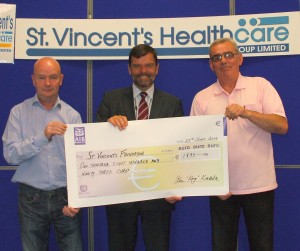 Alan Kinsella and Michael Behan cheque Presenatation June 2014